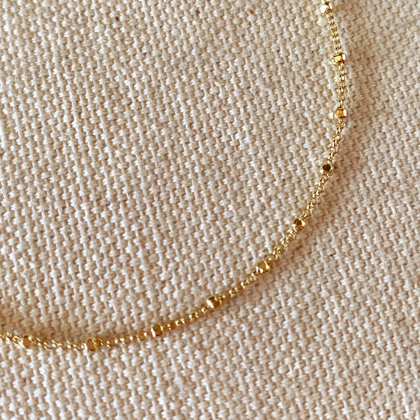 Bracelet à perles espacées de 1 mm rempli d'or 18 carats