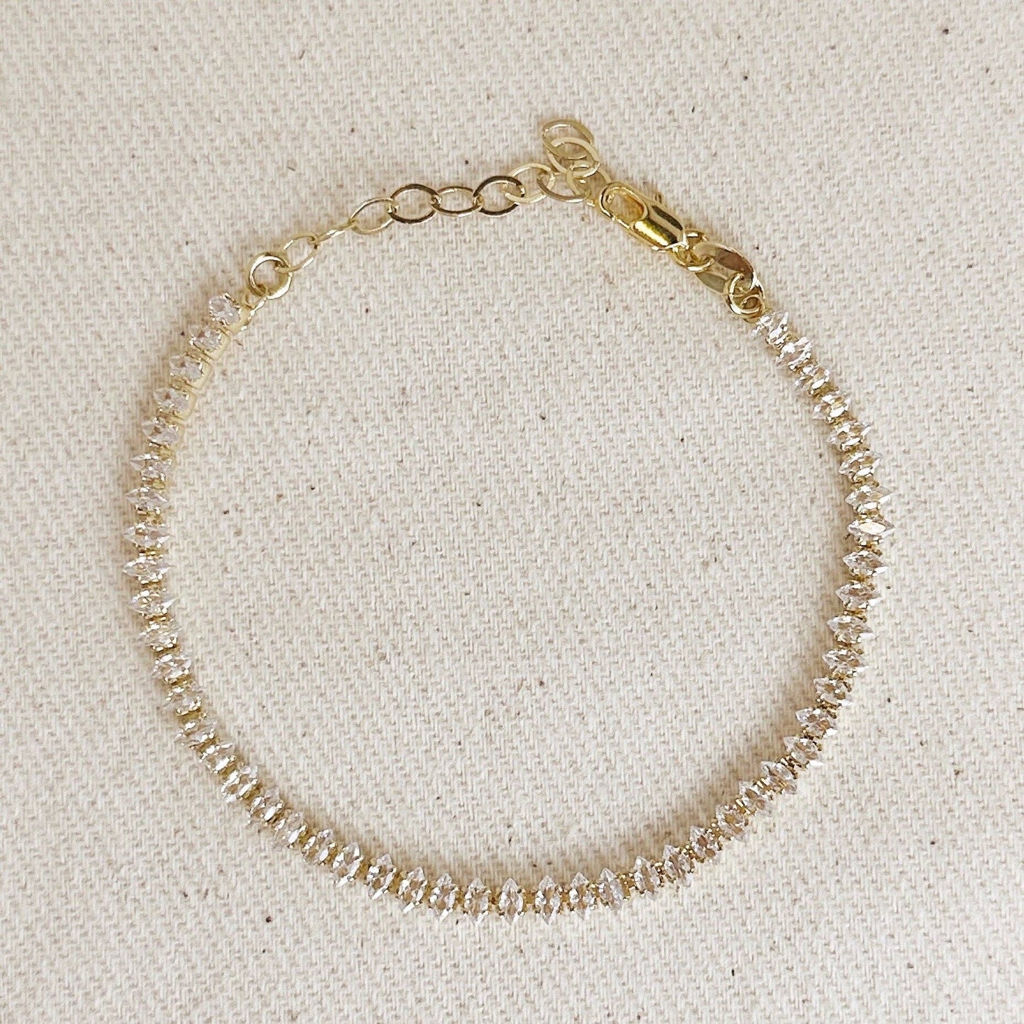 Bracelet de tennis Marquise de 4 mm rempli d'or 18 carats