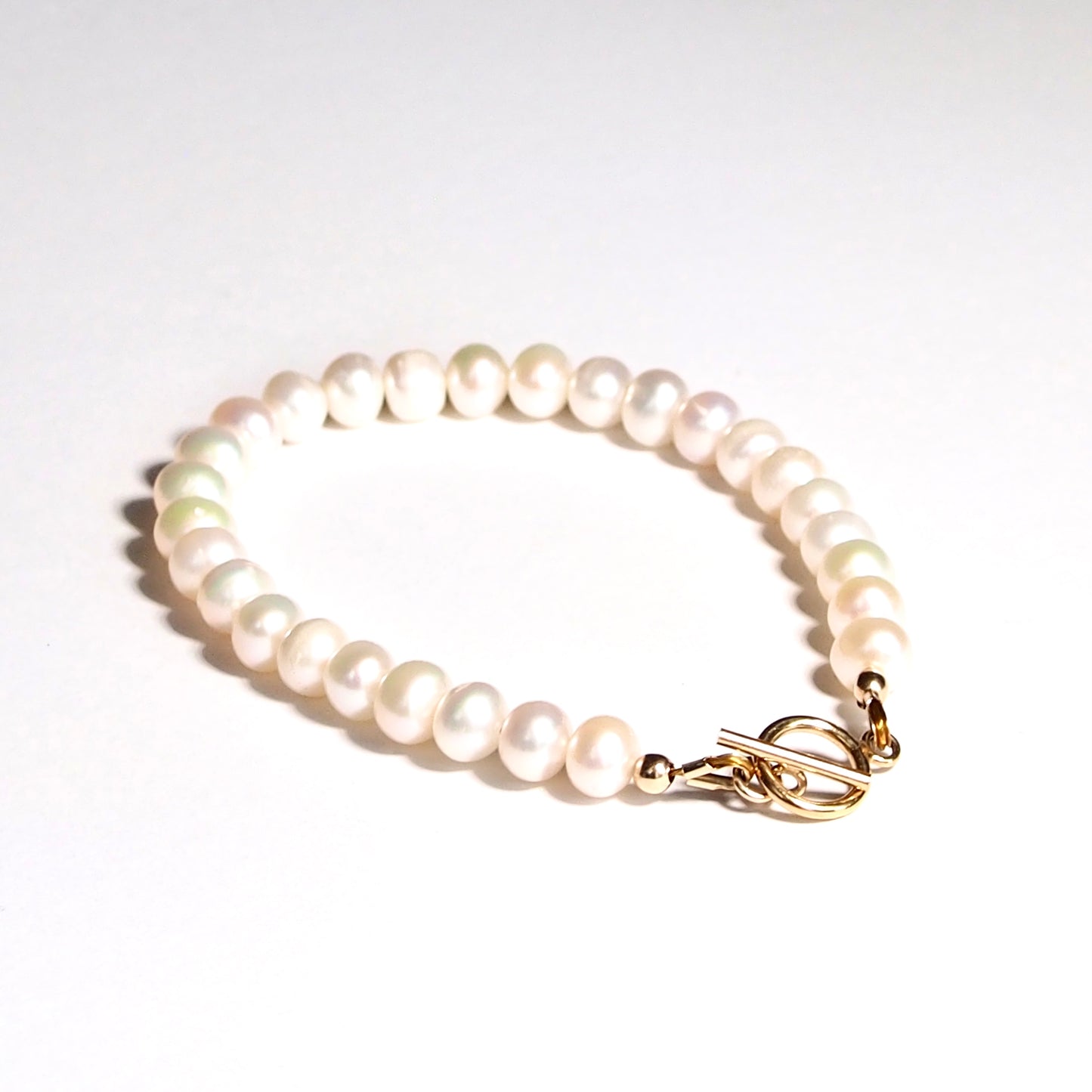 Bracelet véritables perles d'eau douce et or