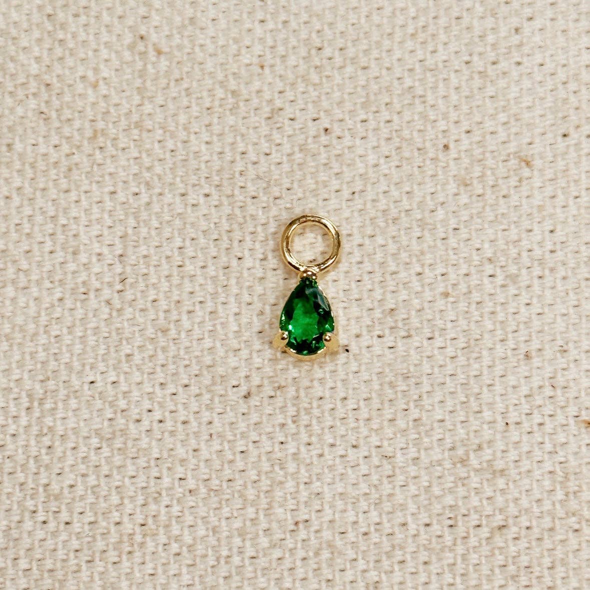 Breloque en forme de petite boucle d'oreille