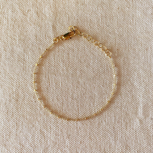 Bracelet à perles espacées de 1 mm rempli d'or 18 carats