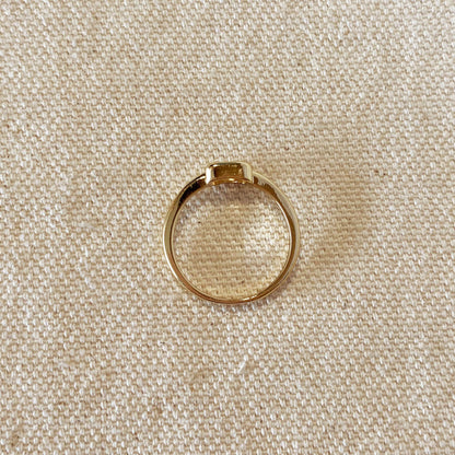 Bague solitaire rectangulaire remplie d'or 18 carats