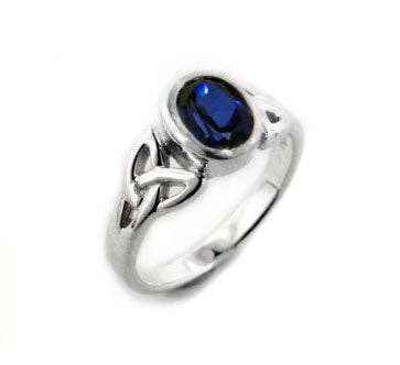 Bague en argent sterling avec nœud celtique et saphir bleu créé