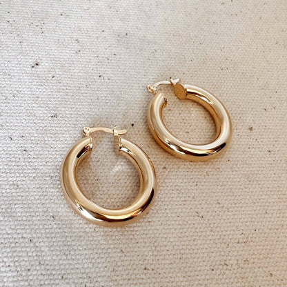 Créoles tubulaires classiques de 25 mm remplies d'or 18 carats