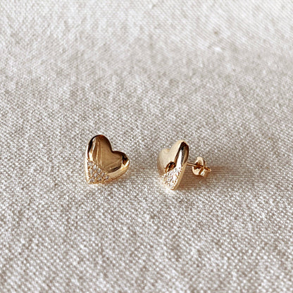 Boucles d'oreilles cœurs en or et zircons cubiques.