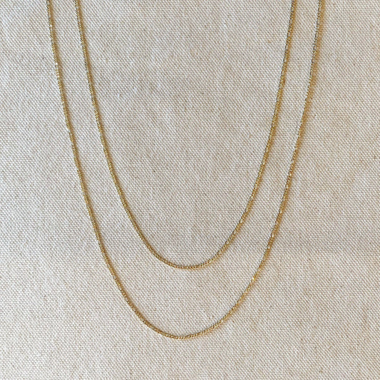 Chaîne Figaro fine en or rempli 18 carats
