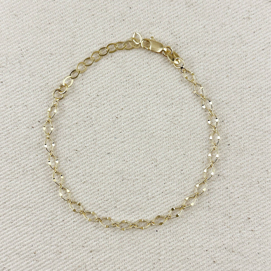 Bracelet chaîne détaillé en or rempli 18k avec coupe diamant