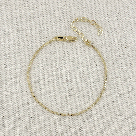 Bracelet à billes plates 1,5 mm en or rempli 18k
