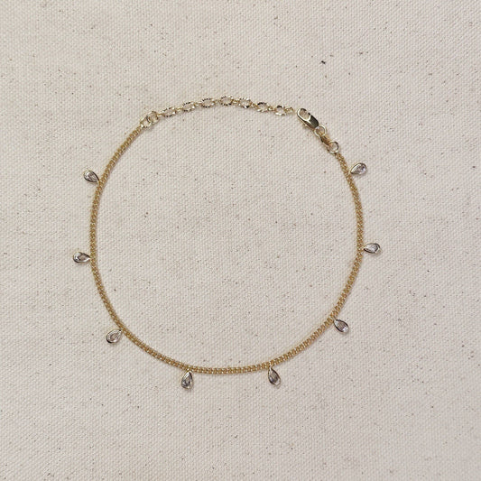 Chaîne gourmette de 2 mm remplie d'or 18 carats avec lunette CZ Drops