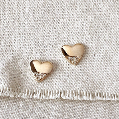Boucles d'oreilles cœurs en or et zircons cubiques.