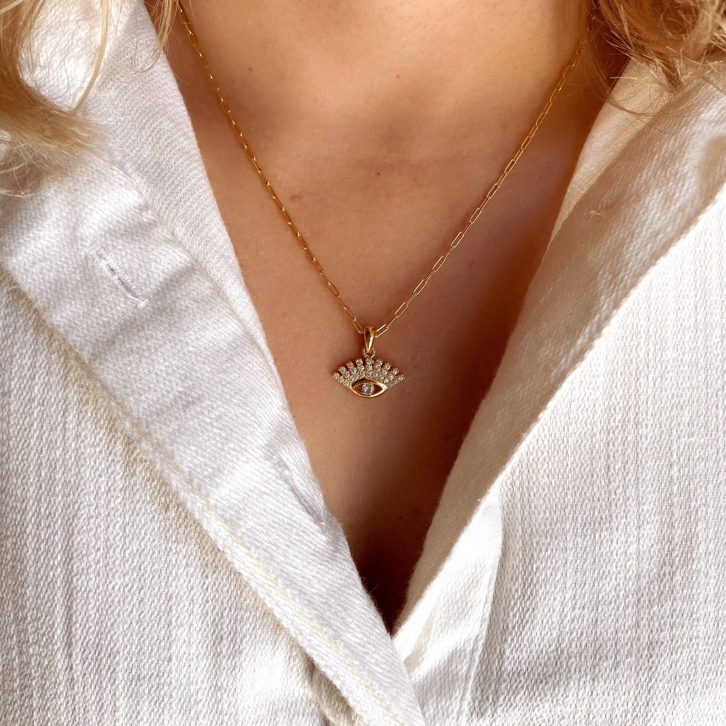 Pendentif œil protecteur délicat en zircone cubique et or 18 carats