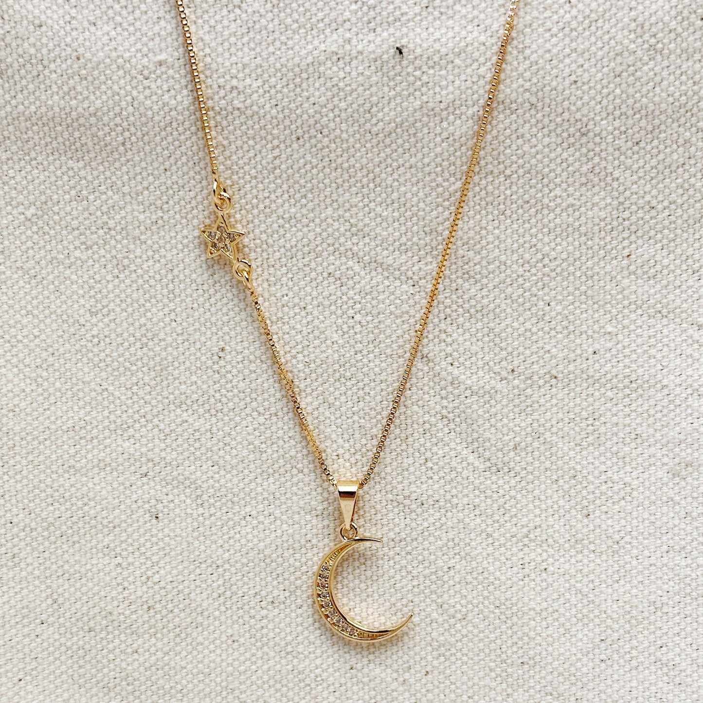 Collier lune et étoile en or 18 carats
